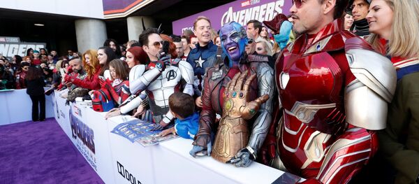 Fans dressed up in costume await the cast members on the red carpet at the world premiere of the film The Avengers: Endgame in Los Angeles Fans dressed up in costume await the cast members on the red carpet at the world premiere of the film The Avengers: Endgame in Los Angeles - Sputnik International