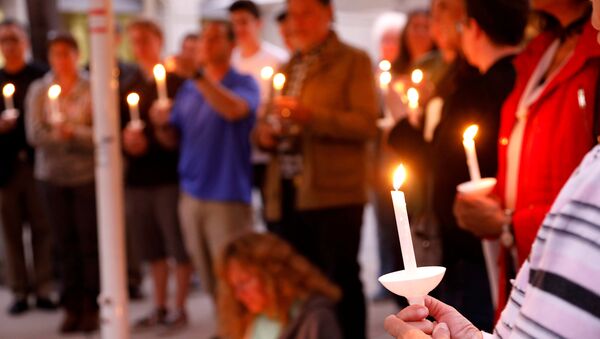 A candlelight vigil is held at Rancho Bernardo Community Presbyterian Church for victims of a shooting incident at the Congregation Chabad synagogue in Poway, north of San Diego, California, U.S. April 27, 2019 - Sputnik International