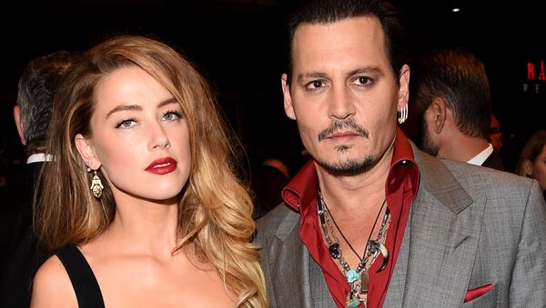 Actors Amber Heard (L) and Johnny Depp attend the Black Mass premiere during the 2015 Toronto International Film Festival at The Elgin on September 14, 2015 in Toronto, Canada. - Sputnik International