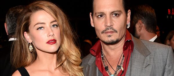 Actors Amber Heard (L) and Johnny Depp attend the Black Mass premiere during the 2015 Toronto International Film Festival at The Elgin on September 14, 2015 in Toronto, Canada. - Sputnik International
