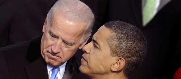US President Barack Obama (R) and Vice President Joe Biden speak during Obama's inauguration as the 44th US president at the Capitol in Washington, DC - Sputnik International