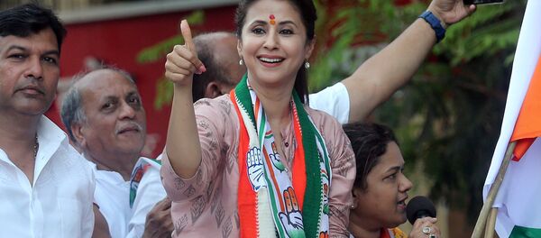 Urmila Matondkar, Bollywood actress-turned-politician who recently joined India's main opposition Congress party, gestures during her election campaign rally in Mumbai, India, April 11, 2019 Urmila Matondkar, Bollywood actress-turned-politician who recently joined India's main opposition Congress party, gestures during her election campaign rally in Mumbai, India, April 11, 2019 - Sputnik International