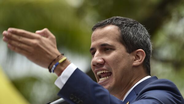 Venezuelan opposition leader and self-proclaimed interim president Juan Guaido addresses supporters during a meeting at Chacao neighbourhood in Caracas on April 19, 2019. - Sputnik International