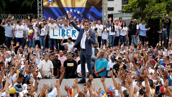 Venezuelan opposition leader Juan Guaido, who many nations have recognised as the country's rightful interim ruler, speaks during a swearing-in ceremony for supporters in Caracas, Venezuela April 27, 2019 - Sputnik International