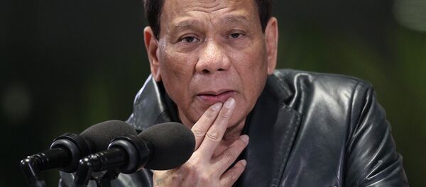 This handout photo taken on June 2, 2018, shows Philippine President Rodrigo Duterte gesturing as he gives his departure speech at the Manila International airport This handout photo taken on June 2, 2018, shows Philippine President Rodrigo Duterte gesturing as he gives his departure speech at the Manila International airport - Sputnik International