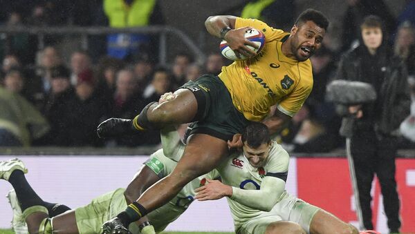Australia's centre Samu Kerevi is tackled by England's Maro Itoje (L) and England's wing Jonny May (R) during the international rugby union test match between England and Australia at Twickenham stadium in south-west London on November 18, 2017 - Sputnik International