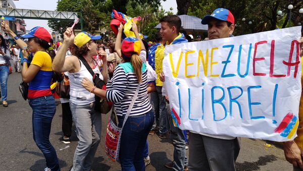 People protest in Venezuela - Sputnik International