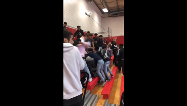 Massive brawl at Waltrip High School in Houston, Texas, unfolds in school gymnasium, leaving multiple students injured. - Sputnik International
