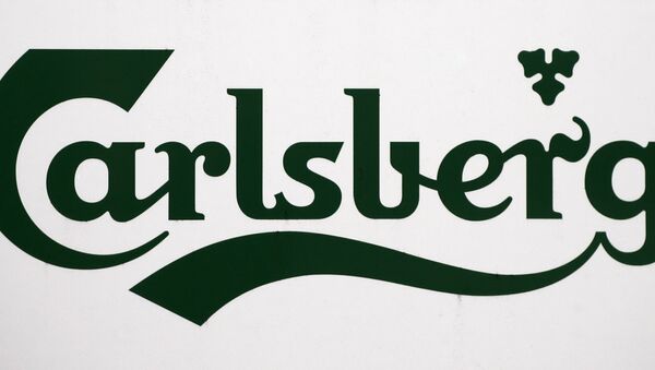 A Carlsberg logo is pictured on a signboard at the brewery in Leeds in west Yorkshire in northeast England, on November 5, 2008 - Sputnik International