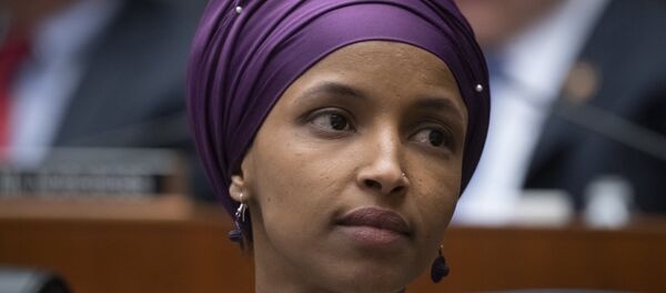 In this March 6, 2019, file photo, Rep. Ilhan Omar, D-Minn., sits with fellow Democrats on the House Education and Labor Committee during a bill markup, on Capitol Hill in Washington In this March 6, 2019, file photo, Rep. Ilhan Omar, D-Minn., sits with fellow Democrats on the House Education and Labor Committee during a bill markup, on Capitol Hill in Washington - Sputnik International