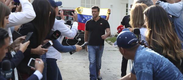 Venezuelan opposition leader Leopoldo Lopez walks to gate of the Spanish ambassador's residence in Caracas to speak with the press, in Venezuela, Thursday, May 2, 2019 Venezuelan opposition leader Leopoldo Lopez walks to gate of the Spanish ambassador's residence in Caracas to speak with the press, in Venezuela, Thursday, May 2, 2019 - Sputnik International