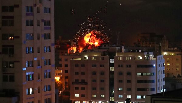 A ball of fire is seen during an Israeli air strike in Gaza City May 4, 2019 - Sputnik International