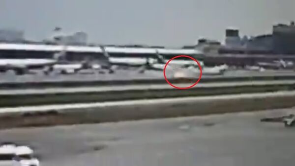 Screengrab of a video allegedly showing a Sukhoi Superjet-100 crash-landing at Sheremetyevo airport in Moscow - Sputnik International