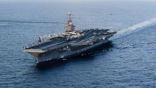 This January 19, 2012 image provided by the US Navy, shows the Nimitz-class aircraft carrier USS Abraham Lincoln (CVN 72) transiting the Arabian Sea. - Sputnik International