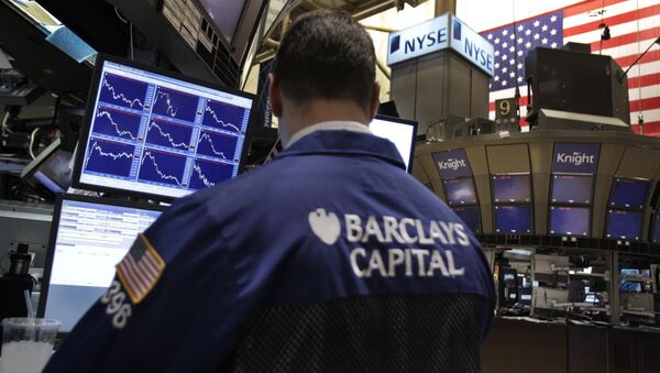 Stocks are shown plunging in graphs on monitors at Barclays Capital booth on the floor of the New York Stock Exchange in New York, Tuesday, Feb. 22, 2011 - Sputnik International
