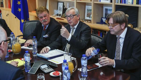 European Commission President Jean-Claude Juncker, center right, meets with members of the Brexit steering committee European Parliament chief Brexit official Guy Verhofstadt, right, and Member of European Parliament Elmer Brock at EU headquarters in Brussels on Monday, Dec. 4, 2017. - Sputnik International
