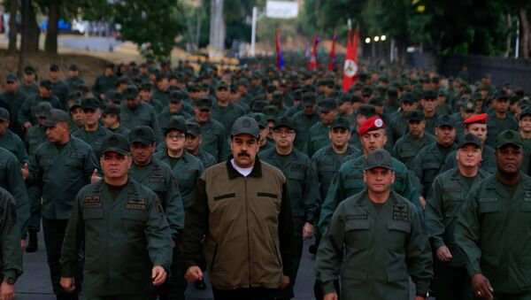 Venezuela's President Nicolas Maduro walks next to Venezuela's Defense Minister Vladimir Padrino Lopez and Remigio Ceballos, Strategic Operational Commander of the Bolivarian National Armed Forces - Sputnik International