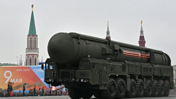 A Russian RS-24 Yars intercontinental ballistic missile system rolls down the Red Square during the Victory Day parade in Moscow on 9 May, 2019 - Sputnik International