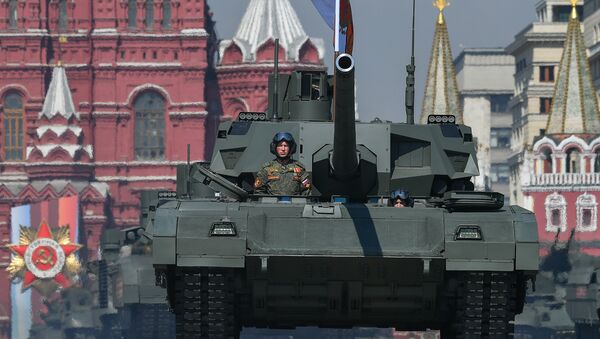 Russian T-14 Armata main battle tanks roll down the Red Square during a rehearsal for the Victory Day parade in Moscow on 9 May, 2019  - Sputnik International