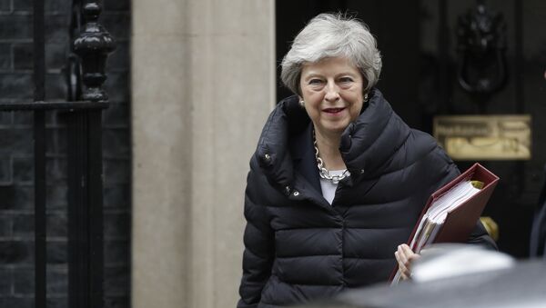 British Prime Minister Theresa May leaves 10 Downing Street in London, to attend Prime Minister's Questions at the Houses of Parliament, Wednesday, May 8, 2019 - Sputnik International