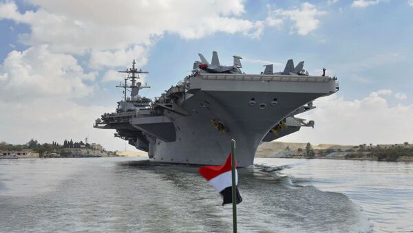 The USS Abraham Lincoln sails south in the Suez canal near Ismailia, Thursday, May 9, 2019 - Sputnik International