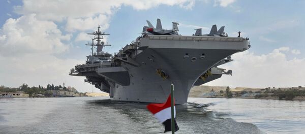 The USS Abraham Lincoln sails south in the Suez canal near Ismailia, Thursday, May 9, 2019 The USS Abraham Lincoln sails south in the Suez canal near Ismailia, Thursday, May 9, 2019 - Sputnik International