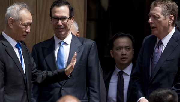 Treasury Secretary Steve Mnuchin, second from left, and United States Trade Representative Robert Lighthizer, right, speak with Chinese Vice Premier Liu He, left, as he departs the Office of the United States Trade Representative in Washington, Friday, May 10, 2019. - Sputnik International