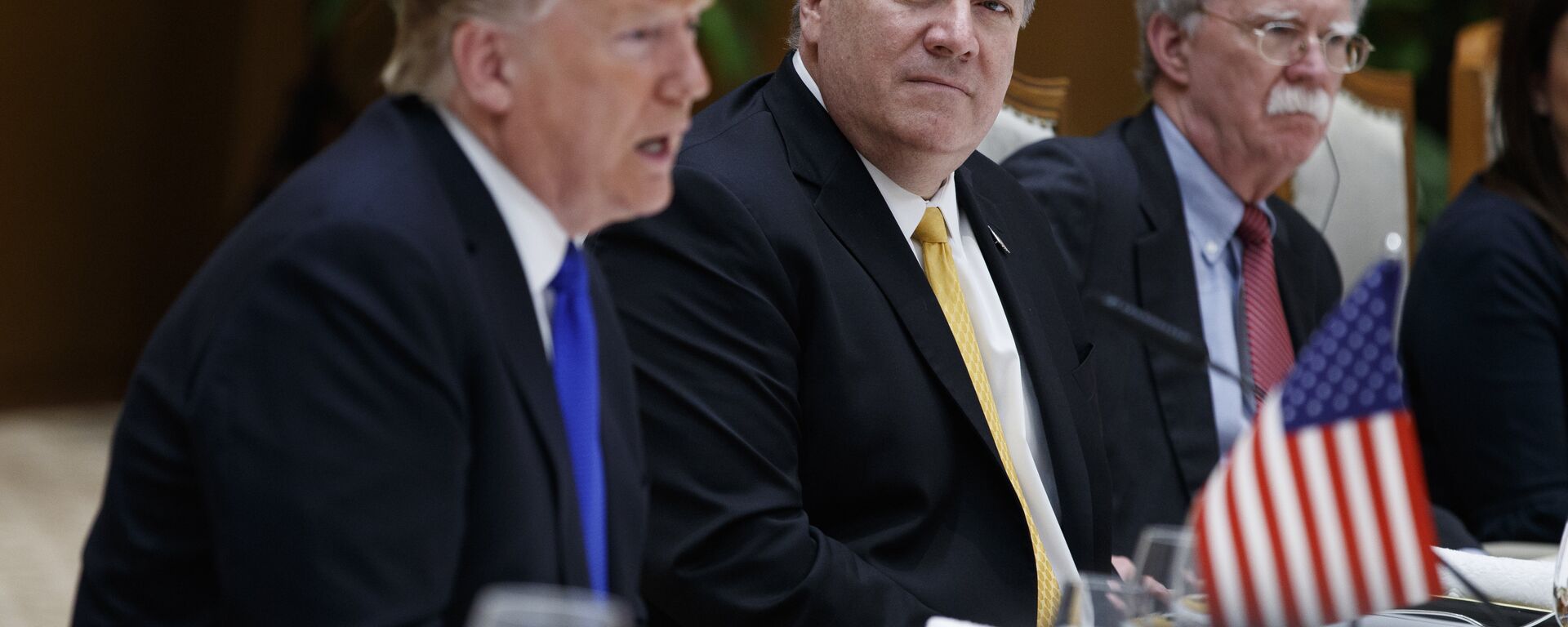 Secretary of State Mike Pompeo, center, and national security adviser John Bolton, right, listen as President Donald Trump speaks during a meeting with Vietnamese Prime Minister Nguyen Xuan Phuc at the Office of Government Hall, Wednesday, Feb. 27, 2019, in Hanoi, Vietnam. - Sputnik International, 1920, 26.07.2024