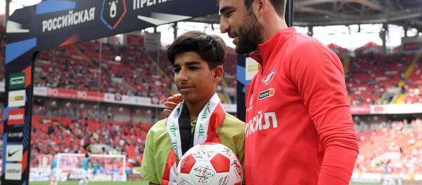 Касим Алькадим из Ирака посетил футбольный матч в Москве Касим Алькадим из Ирака посетил футбольный матч в Москве - Sputnik International