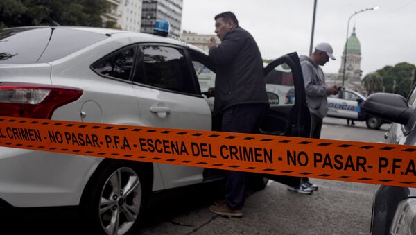 Police stand near the crime scene where Argentine lawmaker Hector Olivares was seriously injured - Sputnik International