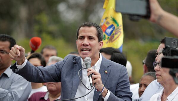 Venezuelan opposition leader Juan Guaido, who many nations have recognised as the country's rightful interim ruler, takes part in a rally in support of the Venezuelan National Assembly and against the government of Venezuela's President Nicolas Maduro in Caracas, Venezuela, May 11, 2019 - Sputnik International