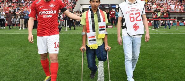 Iraqi boy Qassem Qadim, Hero of Award-Winning Photo of Stenin Contest - Sputnik International