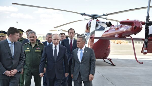 Russian President Vladimir Putin on the site of the inspection of aircraft during a visit to the Kazan Aviation Plant named after S. P. Gorbunov - Sputnik International