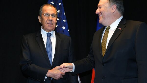 U.S. Secretary of State Mike Pompeo shakes hands with Russia's Foreign Minister Sergei Lavrov as they meet on the sidelines of the Arctic Council Ministerial Meeting in Rovaniemi, Finland May 6, 2019 - Sputnik International