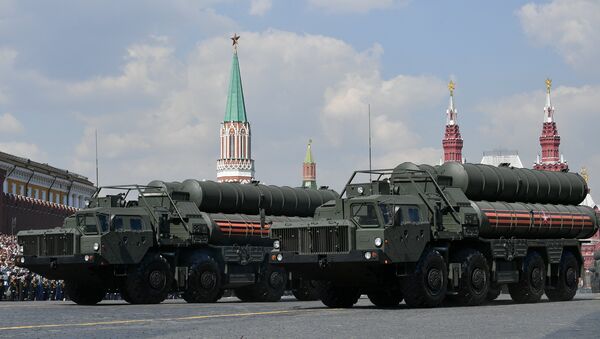 Russian S-400 Triumf surface-to-air missile systems roll down the Red Square during a rehearsal for the Victory Day parade in Moscow, Russia - Sputnik International