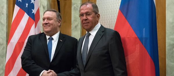 U.S. Secretary of State Mike Pompeo and Russian Foreign Minister Sergey Lavrov shake hands as they pose for a photo prior to their talks in the Black Sea resort city of Sochi, Russia, May 14, 2019 - Sputnik International