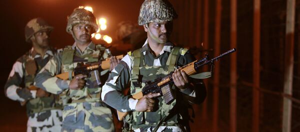 Indian Border Security Force (BSF) soldiers stand guard during a night patrol near the India Pakistan border fencing at Suchet Garh in Ranbir Singh Pura, about 27 kilometers (17 miles) south of Jammu, India, Wednesday, Jan. 17, 2018 Indian Border Security Force (BSF) soldiers stand guard during a night patrol near the India Pakistan border fencing at Suchet Garh in Ranbir Singh Pura, about 27 kilometers (17 miles) south of Jammu, India, Wednesday, Jan. 17, 2018 - Sputnik International