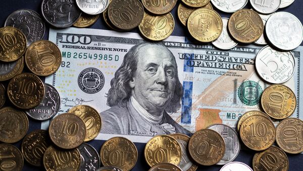 Russian roubles and the bill of the American dollar. - Sputnik International