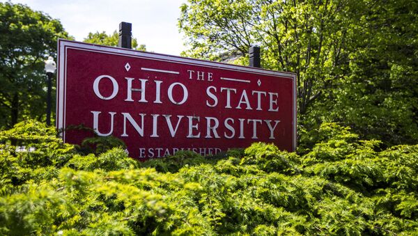 This May 8, 2019 photo shows a sign for Ohio State University in Columbus, Ohio. On Friday, May 17, 2019, the school said at least 177 men were sexually abused by Ohio State team doctor Richard Strauss who died years ago, according to findings from a law firm that investigated the accusations, concluding that school leaders knew at the time. - Sputnik International