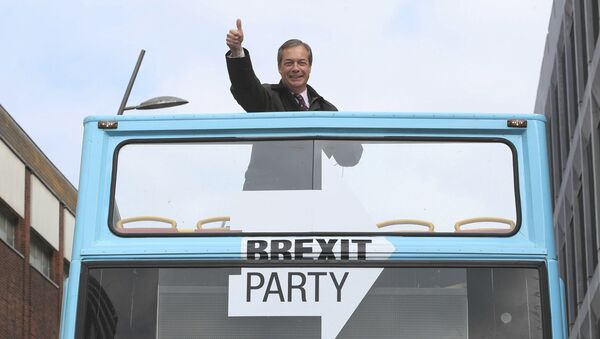 Brexit Party leader Nigel Farage gestures on an open topped bus while on the European Election campaign trail in Sunderland, England, Saturday, May 11, 2019 - Sputnik International