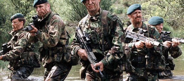 An undated file picture shows British royal marines in water during a training session at an unspecified location An undated file picture shows British royal marines in water during a training session at an unspecified location - Sputnik International