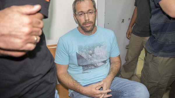 Tal Silberstein, an adviser to Austrian Chancellor Christian Kern, sits at the Israeli Rishon Lezion Justice court, near Tel Aviv on August 14, 2017 after he was detained as part of an international money laundering investigation - Sputnik International