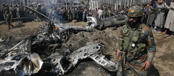 An Indian army soldier walks past the wreckage of an Indian helicopter after it crashed in Budgam area, outskirts of Srinagar, Indian controlled Kashmir, Wednesday, Feb.27, 2019 An Indian army soldier walks past the wreckage of an Indian helicopter after it crashed in Budgam area, outskirts of Srinagar, Indian controlled Kashmir, Wednesday, Feb.27, 2019 - Sputnik International