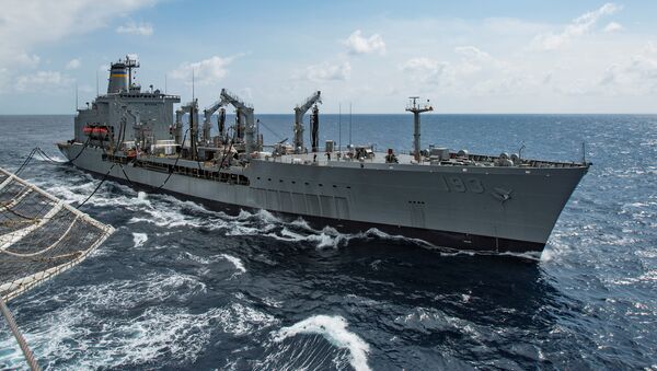 Military Sealift Command fleet replenishment oiler USNS Walter S. Diehl (T-AO 193) pulls alongside hospital ship USNS Mercy (T-AH 19) to deliver supplies and mail by a connected replenishment in the South China Sea August 15, 2016 - Sputnik International