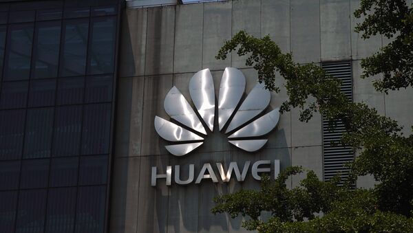 A Huawei company logo is seen at Huawei's Shanghai Research Center in Shanghai, China May 22, 2019 - Sputnik International