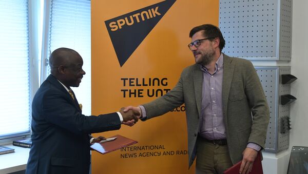 Sergei Kochetkov, Rossiya Segodnya First Deputy Editor-in-Chief, and Ernest Kabila Ilunga, Director General of RTNC. - Sputnik International
