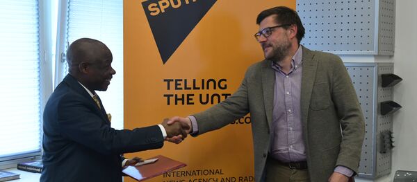 Sergei Kochetkov, Rossiya Segodnya First Deputy Editor-in-Chief, and Ernest Kabila Ilunga, Director General of RTNC. - Sputnik International