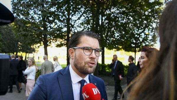 The party leader of the far-right Sweden Democrats, Jimmie Akesson, speaks to the press upon arrival to the opening of the Swedish Parliament Riksdagen on September 25, 2018 in Stockholm - Sputnik International