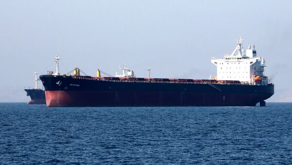 An oil tanker is pictured off the Iranian port city of Bandar Abbas, which is the main base of the Islamic Republic's navy and is strategically positioned on the Strait of Hormuz; 30 April 2019 - Sputnik International