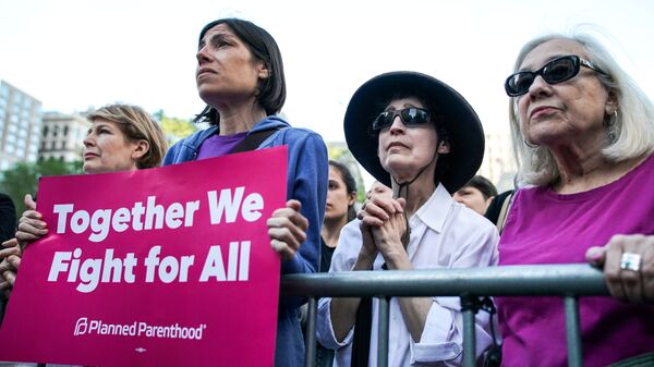 Abortion-rights campaigners attend a rally against new restrictions on abortion passed by legislatures in eight states including Alabama and Georgia, in New York City, U.S., May 21, 2019 - Sputnik International